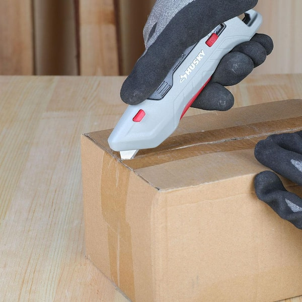 NAVAJA RETRACTIL MULTIUSOS DE SEGURIDAD ALUMINIO HUSKY