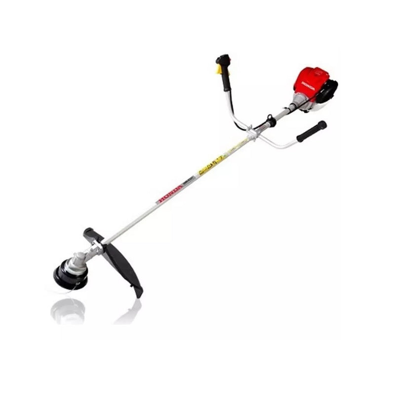 Desbrozadora recta con motor 4 tiempos rojo y disco de corte con protector